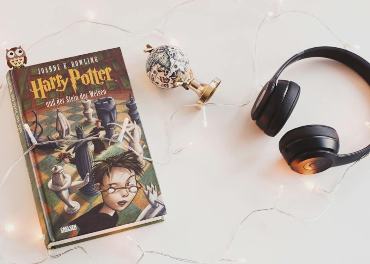 Harry Potter Book and Black Headphones With Trinket