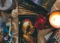 Books and a Lit Candle