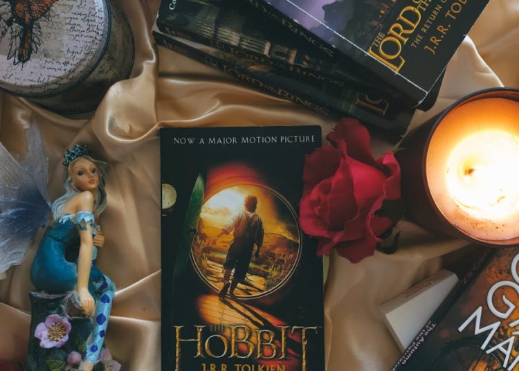Books and a Lit Candle