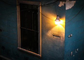 Illuminated Light Bulb OutsideThe House