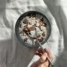 Person Holding Stainless Steel Spoon