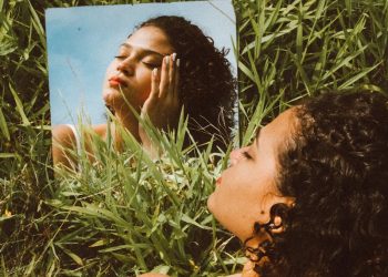 A Woman Lying Down with her Portrait