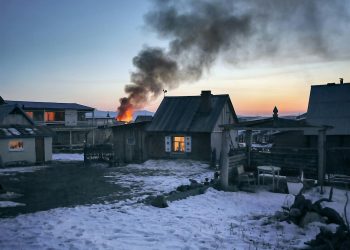 Gray Wooden House Burning