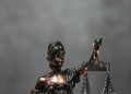 Close-Up Shot of a Statuette of Lady Justice