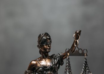 Close-Up Shot of a Statuette of Lady Justice