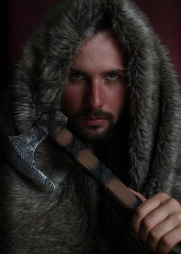 Portrait of a Man Holding an Axe