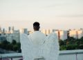 Back View of a Man Wearing an Angel Costume