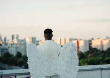 Back View of a Man Wearing an Angel Costume
